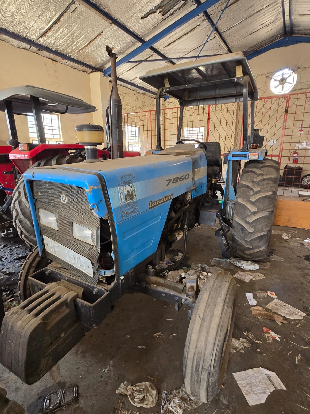 CAT Backhoe Loader — Arm Detail