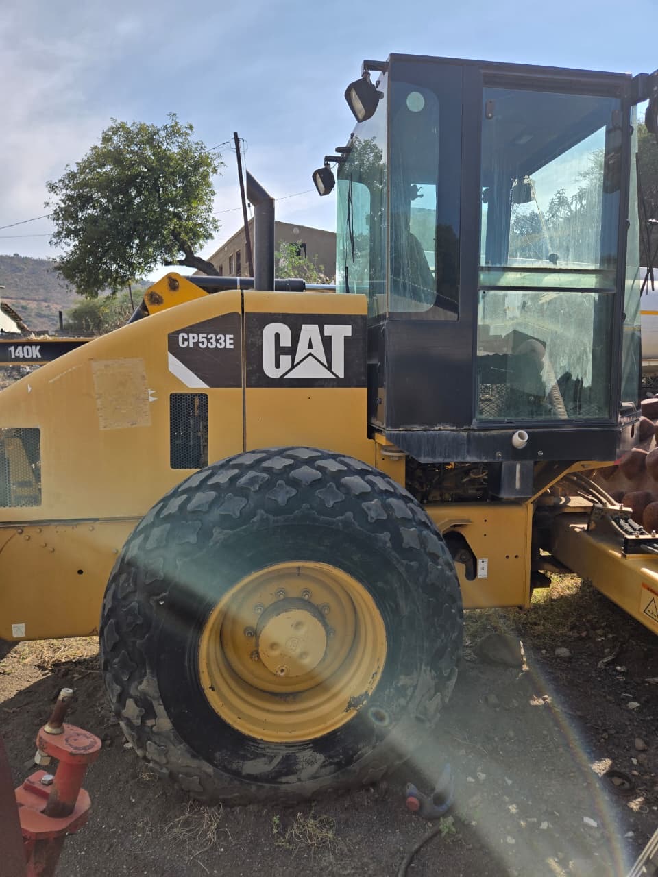 CAT CP533E Padfoot Roller — Cab Side