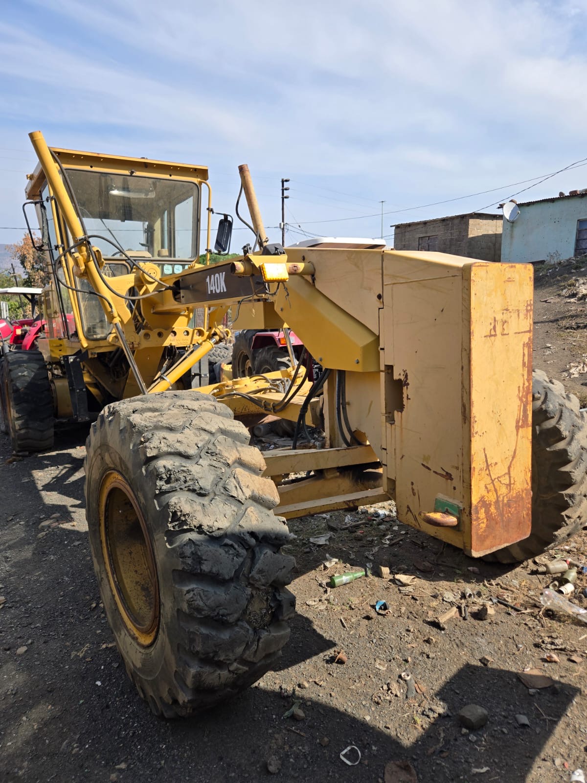 CAT 140K Motor Grader — Front Detail